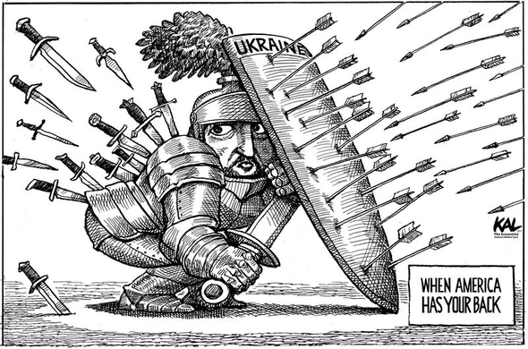 Political cartoon. Volodomyr Zelensky wearing a suit of armor is holding up a shield labelled "Ukraine". Many arrows are hitting the shield. Meanwhile, behind the shield, Zelensky is being stabbed in the back by many knives. In the bottom right corner of the cartoon is a text box that reads, "When America has your back"
Credit: KAL, The Economist