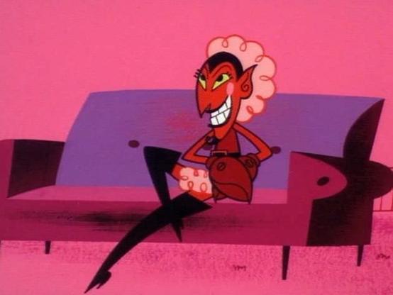 HIM from PPG sitting on a couch looking smug AF