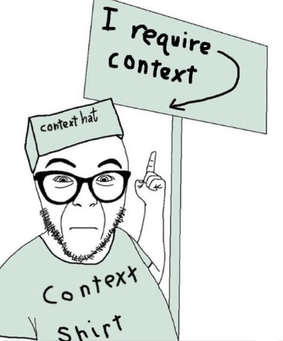Context man wearing a "Context shirt" shirt with a box on his head that reads "context" hat pointing up at a sign that reads "I require context".