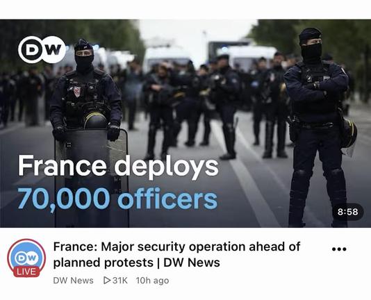 A video shows two masked police officers on a street, with the text "France deploys 70,000 officers" and "France: Major security operation ahead of planned protests | DW News" below.