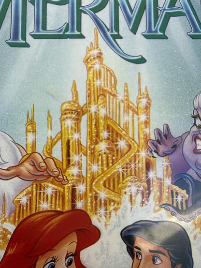 Cover of The Little Mermaid's VHS version with the castle made of penises.