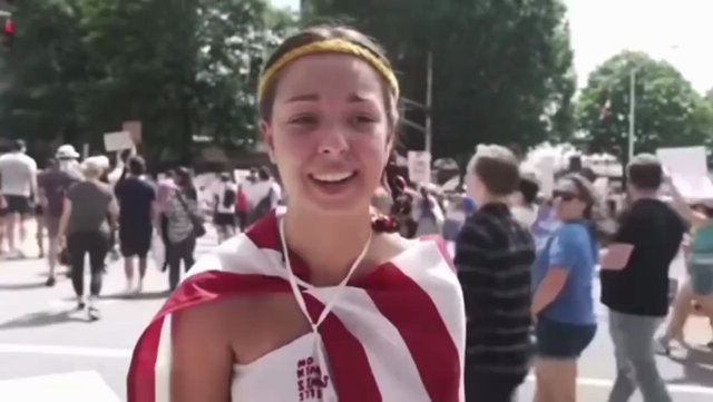 a young woman (unidentified, i tried, all i could find is that she might be from Ohio) in a No Kings protest interviewed on the street in June 2025